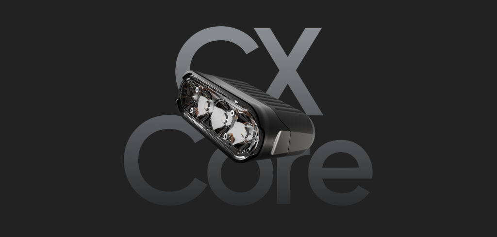 Gloworm CX Core Self-Contained Light System showing internal LED array and lens configuration with mounting bracket against dark background