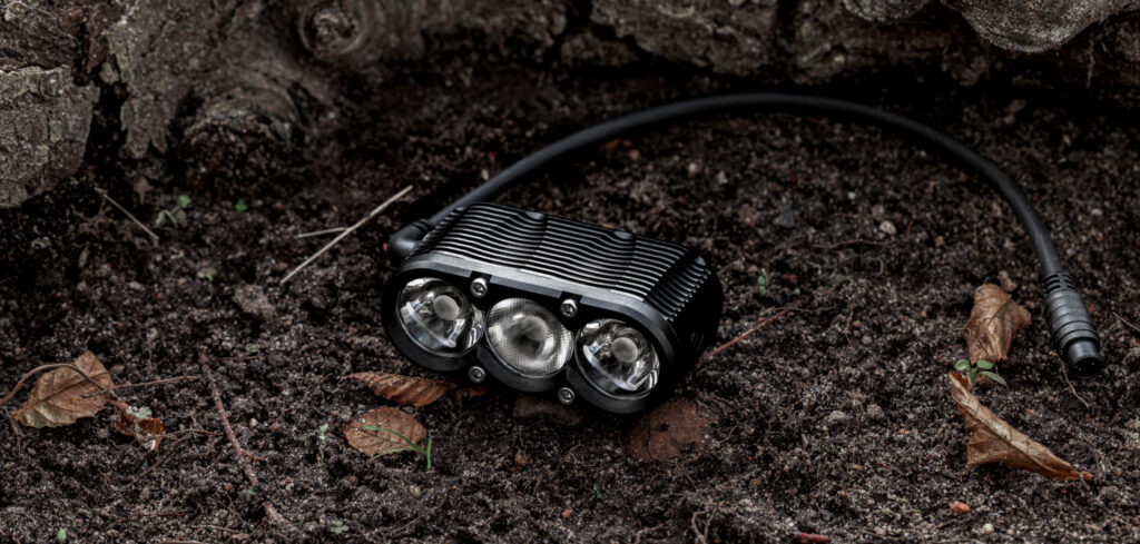 Gloworm XSV G2.1 external battery bike light with keyed 3-pin connector on trail