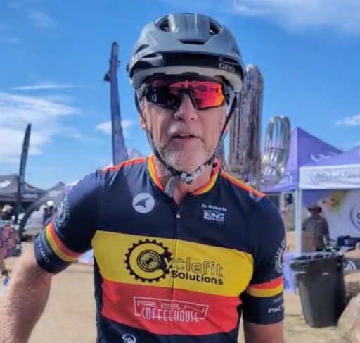 Racer Ed Mason at the 24 Hours at Old Pueblo 2026, after finishing his race with the Gloworm CX Core Light System.